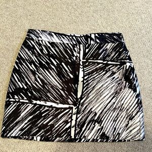 Milly mini skirt, great for work or play, size 8